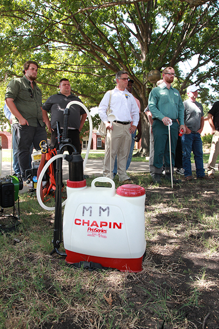 mosquito control class learns about insecticide spray equipment 
